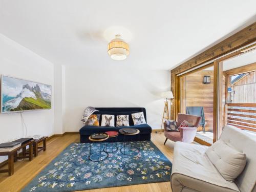 Appartement neuf, luxueux, au cœur des Gets avec terrasse, parking sécurisé, proche commerces et pistes.