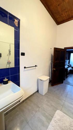 a bathroom with a white sink and a shower at Casa Tradicional Canaria in Garachico