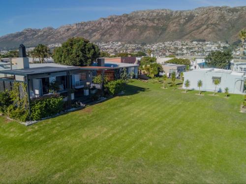 an aerial view of a house with a yard at Palmview Cottage in Cape Town