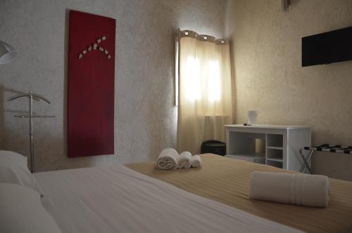 Una cama o camas en una habitación de Secret B&B