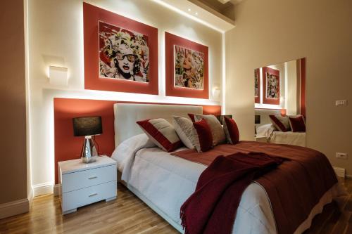 Ένα ή περισσότερα κρεβάτια σε δωμάτιο στο Apart Hotel Torino