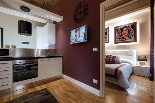 Η κουζίνα ή μικρή κουζίνα στο Apart Hotel Torino