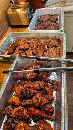 three trays of food sitting on a table at BelizeprivateChef in Dangriga