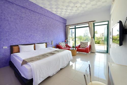 Katil atau katil-katil dalam bilik di Da Jen Shan Style Resort