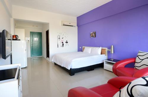 Katil atau katil-katil dalam bilik di Da Jen Shan Style Resort