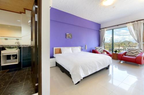 Katil atau katil-katil dalam bilik di Da Jen Shan Style Resort