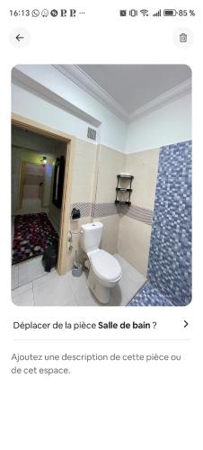 a bathroom with a toilet in a room at Benjelloun in Marrakesh