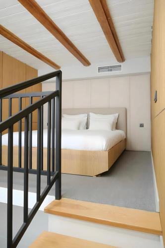 a bedroom with a bed in a room at Gaia in Türkistan