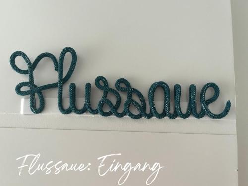 a sign that says blissamine on a white wall at Havelzeit in Havelberg