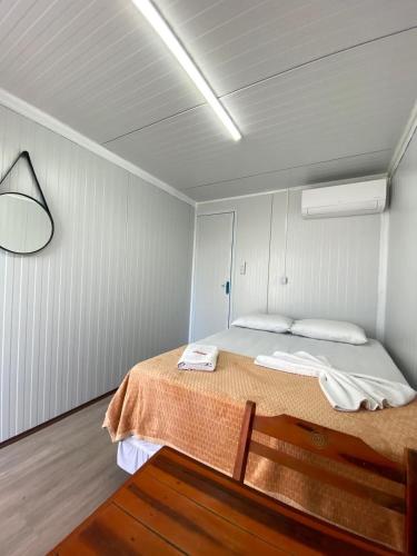 a bedroom with a bed in a room at Pousada Villa Sítio in Campina Grande