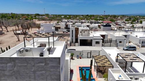 an aerial view of a city with white buildings at 3BR House with Pool & Rooftop Terrace in El Centenario