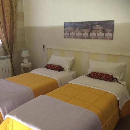 Postel nebo postele na pokoji v ubytování A Casa di Mich