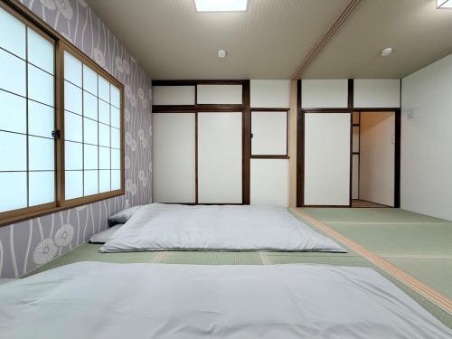 Mizuki 5-minute walk from Tsuruhashi Station Detached house Japanese-style room with tatami mats Maximum 5 people Namba 6 minutes, Tennoji 6 minutes Kansai Airport Nara JR, Kintetsu, Sennichimae