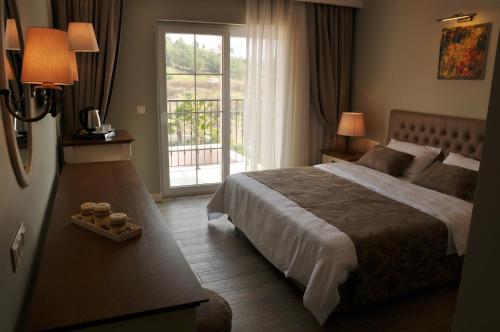 מיטה או מיטות בחדר ב-Sarban Hotel