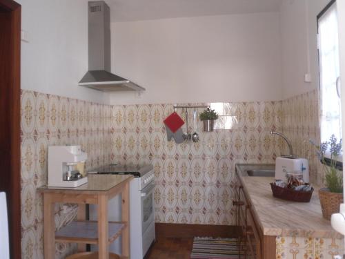 Dapur atau dapur kecil di Casas DeCá & DeLá