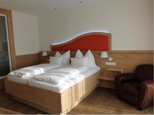 Ένα ή περισσότερα κρεβάτια σε δωμάτιο στο Seminarhotel Daniels