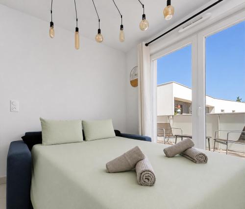 Charmant T2 climatisé avec balcon et parking