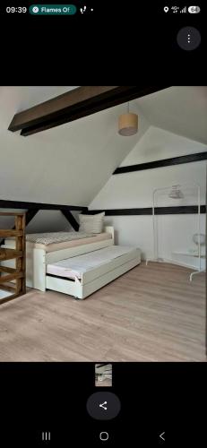a bedroom with two beds in a room at Ferienidyll an der Recknitz in Tessin
