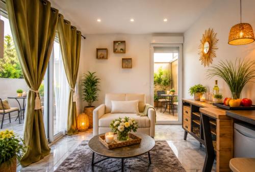 a living room with a couch and a table at Magic Disney 5mn Peaceful Home Garden Parking in Chessy