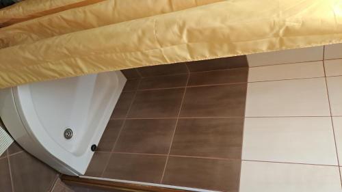 a kitchen floor with a white counter top and a counter top at Vila Vesna in Gornji Karin