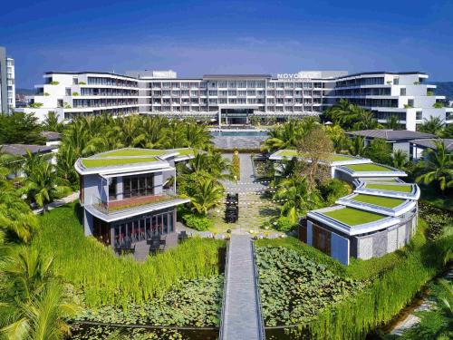 an aerial view of a resort with a building at Novotel Phu Quoc Resort in Phú Quốc