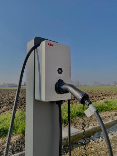 a gas pump with a hose hooked up to it at Corte Motte in Pegognaga