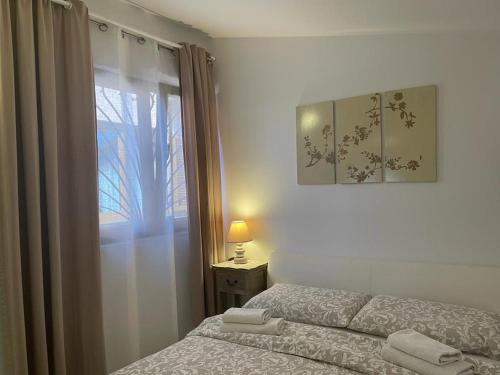 Lovely apartment with pool and garden