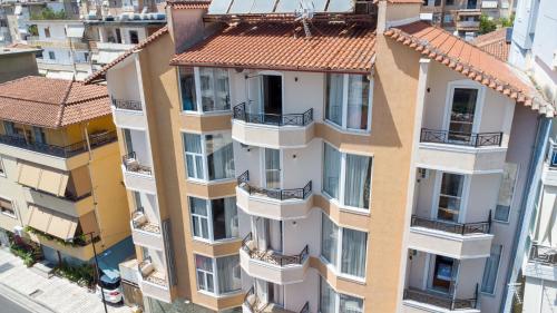 an overhead view of an apartment building with balconies at Hotel Boutique Vioalv in Sarandë