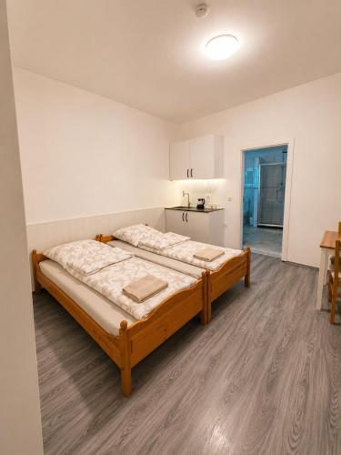 a bedroom with a large bed in a room at Vacation Room in Traben-Trarbach