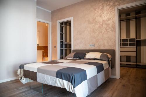 a bedroom with a large bed in a room at Entire house for couple with exclusive pool in Monsanto
