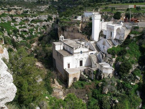 a building on the side of a mountain at Il Carrubo in Massafra