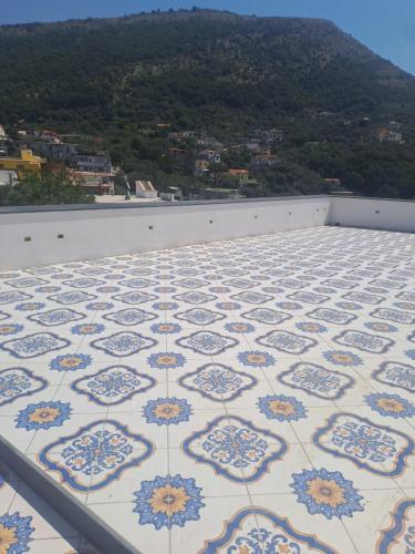 a tile floor on the roof of a building at Relais Soleil in Vico Equense