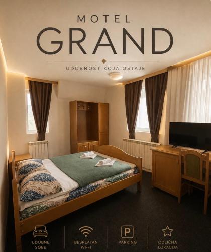 a hotel room with a bed and a tv at Motel Grand in Rožaje