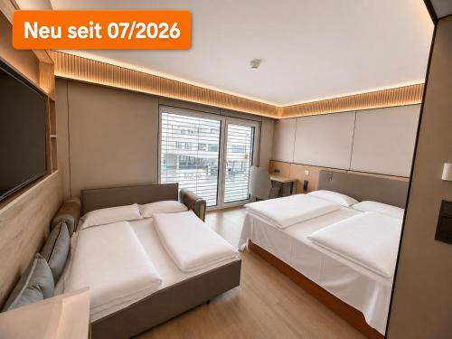 Llit o llits en una habitació de Hotel MUSE