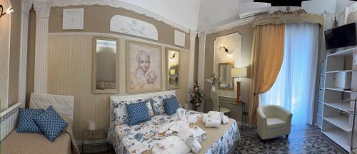 a bedroom with a bed with stuffed animals on it at Casa Costanza 25 in San Cipirello