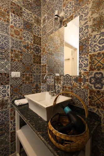 a bathroom with a sink and a mirror at calming valley in Luxor