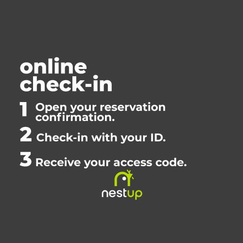 a sign that reads online check in open your reservation at nestup - Hildesheim Zentral in Hildesheim