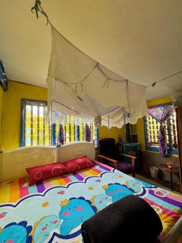 a bedroom with a large bed in a room at Salote homestay in Lautoka