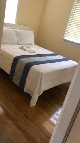 a large bed in a room with at Valley Nest 758 in Castries