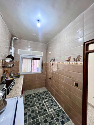 a bathroom with a shower and a sink at velaris in Chefchaouen