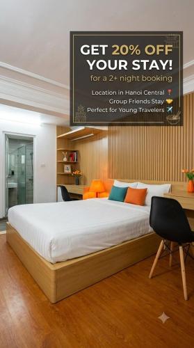 a bedroom with a bed and a sign that says get off your stay at Hanoi Discovery Travel Hotel in Hanoi