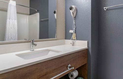 a bathroom with a sink and a mirror at Extended Stay America Suites - Washington, DC - Centreville - Manassas in Centreville