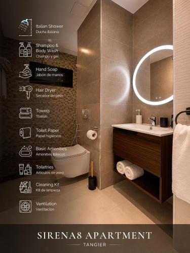 a bathroom with a sink and a toilet and a mirror at Sirena Apartment Tangier in Tangier