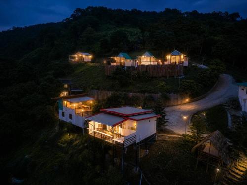 an aerial view of a house at night at Doi Lan Home stay ดอยล้านโฮมสเตย์ in Ban Huai Khai