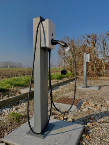 a utility box with a hose coming out of it at Corte Motte in Pegognaga