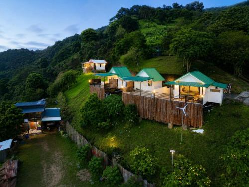 an aerial view of a resort on a hill at Doi Lan Home stay ดอยล้านโฮมสเตย์ in Ban Huai Khai