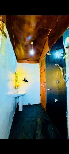 a bathroom with a white sink in a room at Ella Jungle Rock in Ella