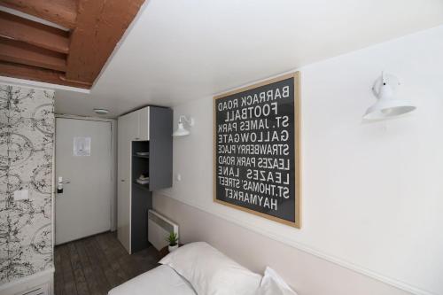 Studio parisien 20m2 en face du musee Grevin - 2P