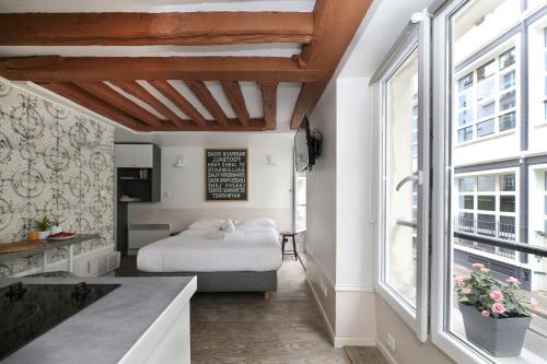 Studio parisien 20m2 en face du musee Grevin - 2P