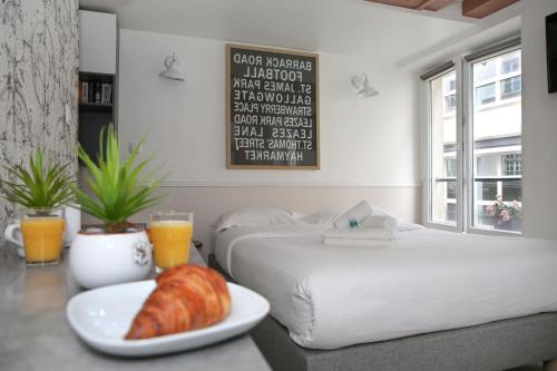 Studio parisien 20m2 en face du musee Grevin - 2P